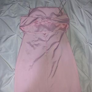 light pink mini dress with a tie back